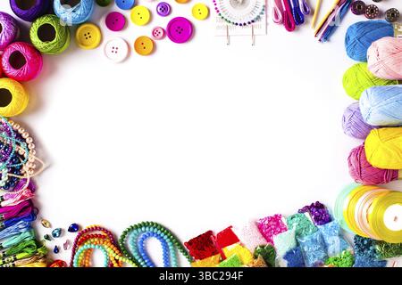Craft supplies for handmade frame on white background. Top view with copy space. Organizing DIY craft elements Stock Photo
