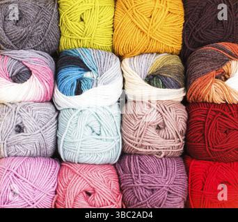 Various colors threads on rows in the store Stock Photo
