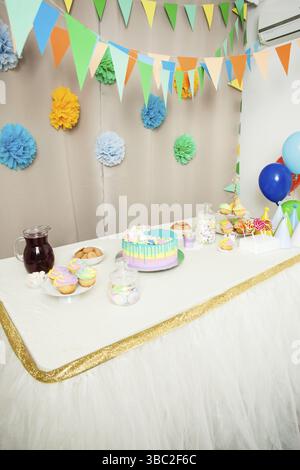 Decorated table in the room for Happy Birthday Party without people Stock Photo