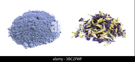Two piles of blue matcha tea powder and blue butterfly pea flowers isolated on the white Stock Photo