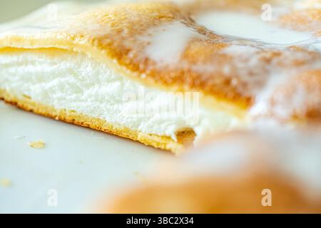 Slice of omelette poulard with pancakes on a light background. close-up. High quality photo Stock Photo