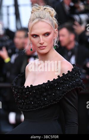 Alex Consani attends the premiere of The Phoenician Scheme at the 78th