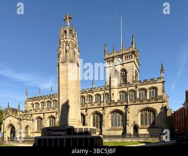 All Saints parish church of Wigan and war memorial in Wigan town centre Stock Photo