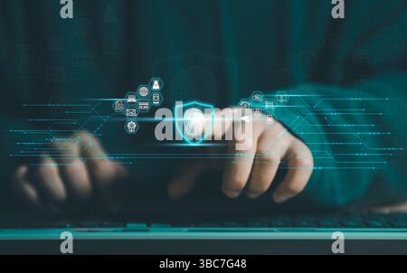 Cybersecurity and privacy concepts to protect data. Business Finger press on the fingerprint icon and internet network security technology. Virtual sc Stock Photo