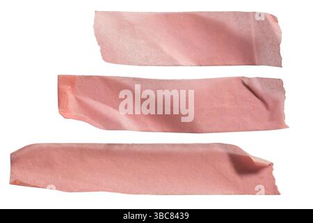 Pieces of pink masking tapes in different length on white background with clipping path Stock Photo