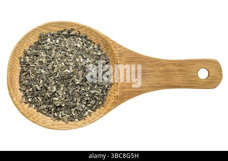 Dried wakame seaweed - top view of a wooden spoon isolated on white Stock Photo