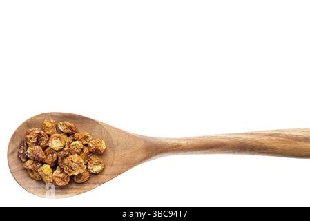 Dried goldenberries on a wooden spoon isolated on white with a clipping path Stock Photo