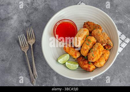 Crispy Fish Sticks Garnished with Fresh Parsley Directly Above Photo Stock Photo