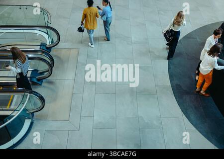 Professionals in a corporate office lobby setting symbolize business growth, highlighting teamwork and consulting. Ideal image for corporate presentat Stock Photo