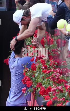 Carlos Alcaraz of Spain celebrates with the coach Juan Carlos Ferrero after winning the men final of the Internazionali BNL d'Italia 2025 tennis against Jannik Sinner of Italy at Foro Italico in Rome, Italy on May 18, 2025. Stock Photo