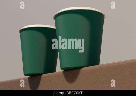 Two green paper coffee cups sit on a surface. Mockup 3d rendering Stock Photo