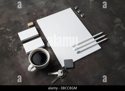 Blank corporate stationery set on concrete background. Template for branding design. Stock Photo