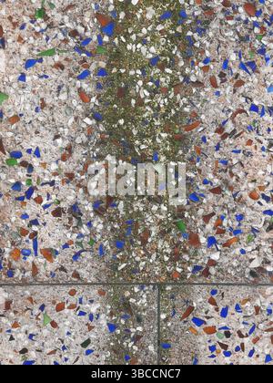 Colourful vintage mosaic tiles pattern with patches. perfect for backgrounds or textures. Stock Photo