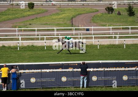 UAE President Cup 2025 at Capannelle hyppodrome. Horse HM ALCHAHINE (12) with jockey Cristian Demuro, about to win the race. Stock Photo