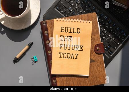Build Your Brand text on paper with wihte clip. On black background Stock Photo