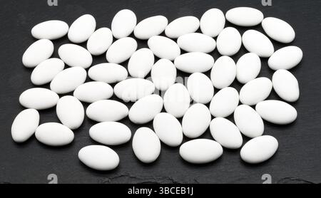 Jordan almonds isolated on black background. Stock Photo