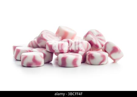 Colorful striped candies isolated on a white background. Stock Photo