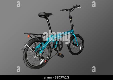 Folding compact bike. Close-up. Isolated on grey background. Stock Photo