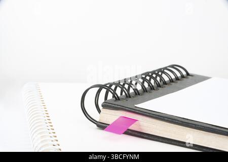 Blank Opened Spiral Notebook Placed On A Table Showing New Ideas Stock Photo
