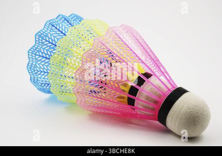 Shuttlecocks in different colors on white background Stock Photo