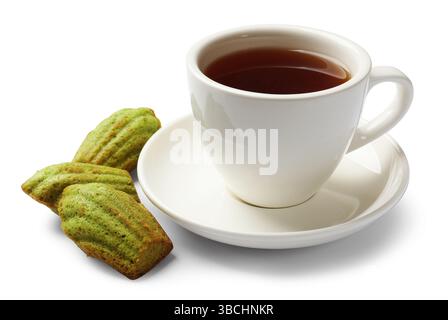 Tasty matcha madeleine cakes and tea isolated on white Stock Photo