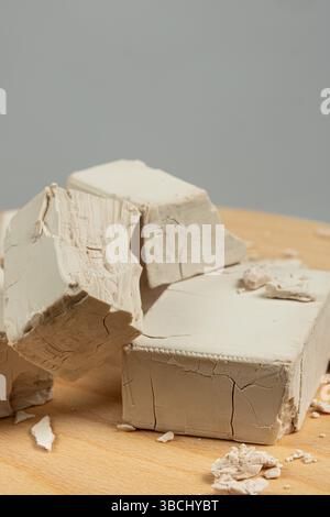 Fresh Compressed Yeast Blocks on Gray Background Stock Photo