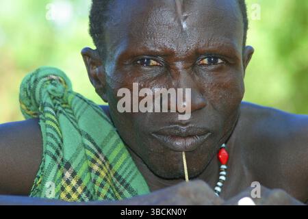 Toposa man with scar on forehead, Nyanyagachor, Sudan, Toposa man with scar on forehead, Nyanyagachor, Sudan, Africa Stock Photo