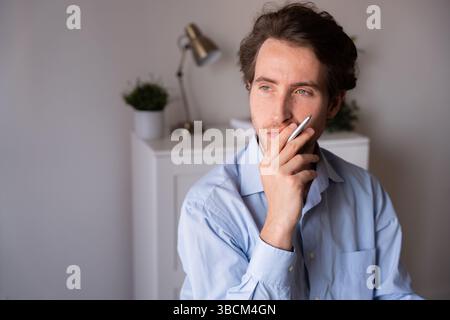 Employee working from home with a laptop, communication, and business strategy Stock Photo