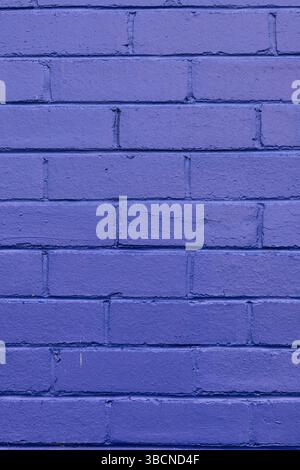 purple painted brick wall Stock Photo