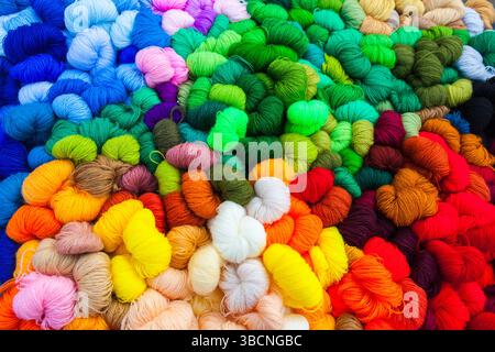 Yarn. Background from multi-colored threads for knitting closeup. Stock Photo