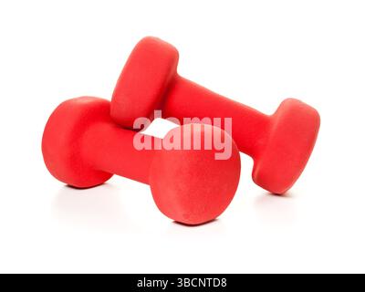 Pair of red rubber-coated dumbbells isolated on whiote background Stock Photo