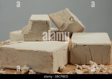 Fresh Compressed Yeast Blocks on Gray Background Stock Photo
