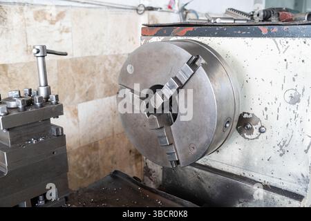 Machining of metal by cutting on a turning and milling machine Stock Photo