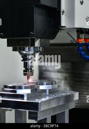CNC lathe milling machine cutting featuring high precision the metal part , The hi-technology parts manufacturing Stock Photo
