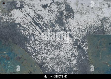 Metal surface with chipped paint and rusty geometric shapes. Abstract background. Stock Photo