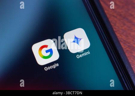 Close-up of a smartphone home screen showing Google and Gemini AI app icons, highlighting modern artificial intelligence and search tools. Stock Photo