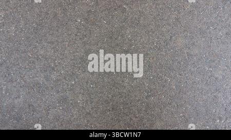 Background from a part of a pavement slab, asphalt pavement Stock Photo