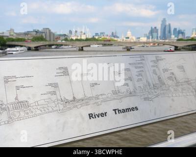 Sign of buildings and landmarks viewed from the Golden Jubilee Bridge over the river Thames, London, UK Stock Photo