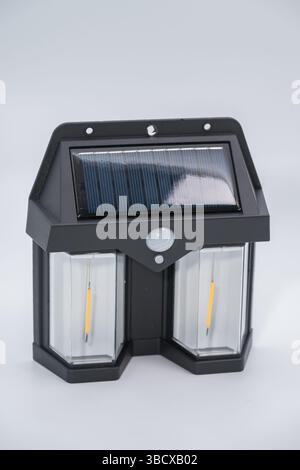.Double solar wall lamp, outdoor, waterproof, motion sensor, powerful lighting Stock Photo