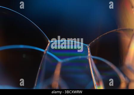 Blue reflections of liquid in macro, bright liquid surface, bubbles in macro, connection of bubbles in macro, cell from liquid, scientific background Stock Photo
