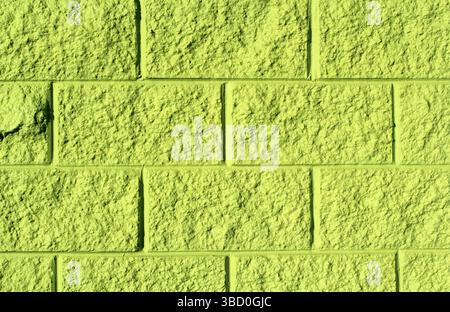 Lime green brick wall abstract textured background Stock Photo