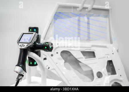 Close up touch probe of Automatic Coordinate measurement machine by CMM, Inspection dimension aluminum automotive parts by cnc programing control, hig Stock Photo