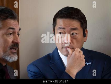 Texas state Rep. Gene Wu speaks to media outside the house chambers at