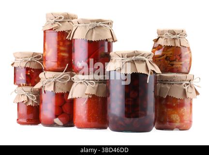 Many jars with different pickled products isolated on white Stock Photo