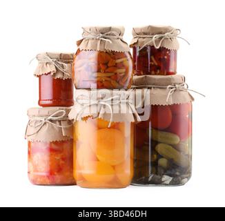 Many jars with different pickled products isolated on white Stock Photo