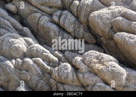 Round polished granite rocks as texture or background Stock Photo