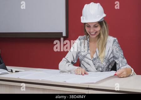 Woman working, projecting on table, architect, engineer Stock Photo