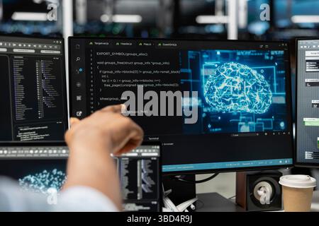 Close up of server hub specialist using artificial intelligence to reduce downtime. Computer scientist designs and implements AI driven solutions for data center equipment Stock Photo