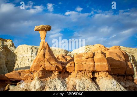 Utah's wilderness where sandstone hoodoos stand tall. These unique, eroded rock formations create a majestic desert landscape. Stock Photo