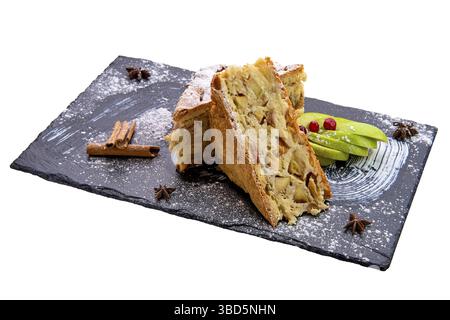 Apple pie on slate plate isolated on white Stock Photo